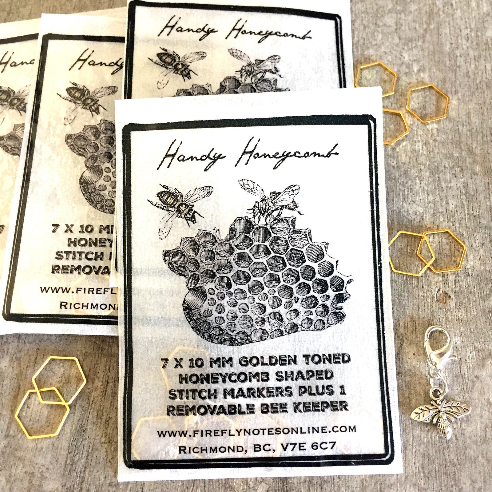 Honeycomb stitch marker and bee progress keeper.