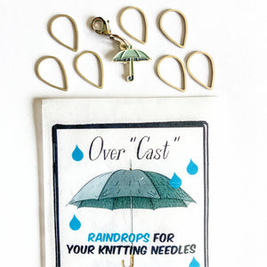 Raindrop stitch markers and umbrella progress keeper